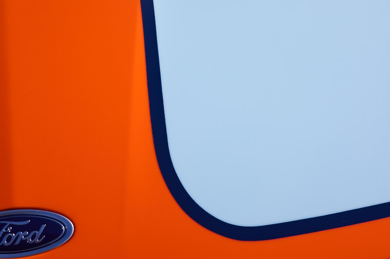 Ford badge on orange and pale blue Gulf livery