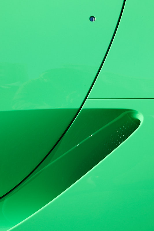 Side intake scooped into green bodywork