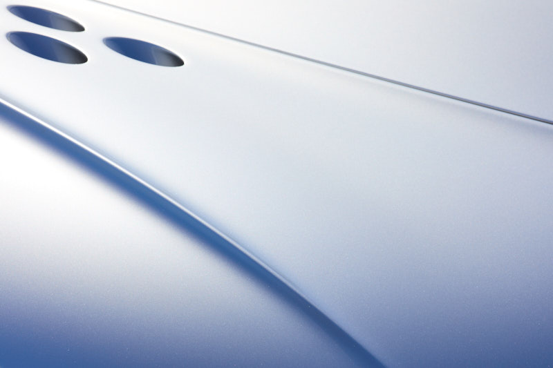 Three louvred vents on a silver fender